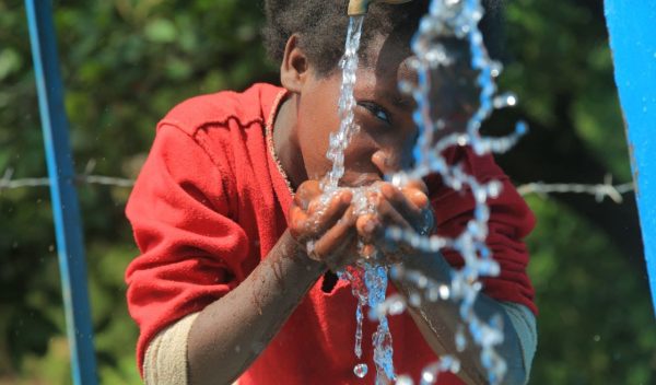 CHILDREN DRINKING WATER(1)