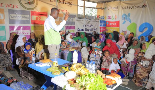 Mr. Demelash WOH nutrition officer providing health education at the PLW foood preparation workshop Mr. Demelash WOH nutrition officer providing health education at the PLW foood preparation workshop